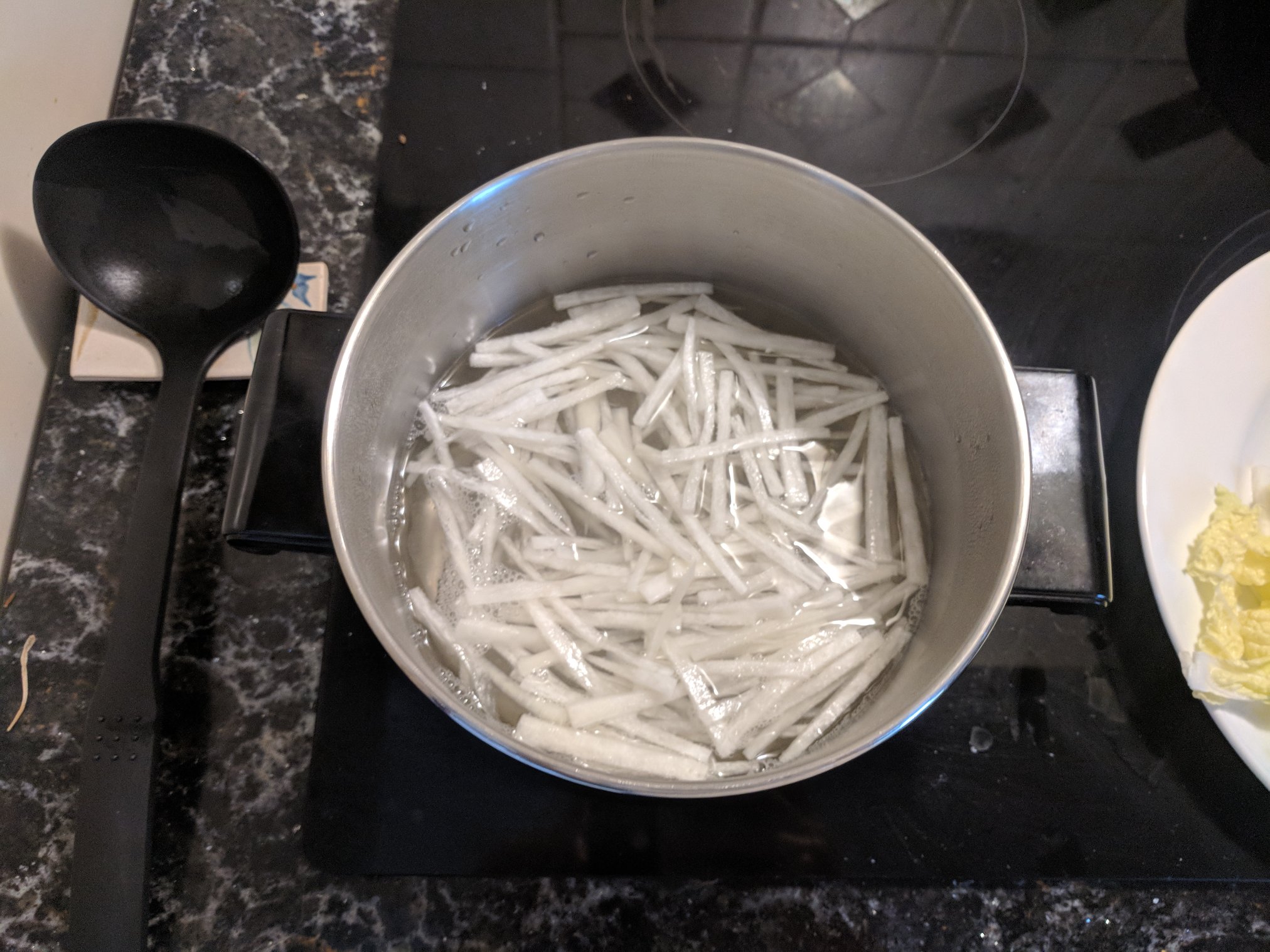 Daikon into the pot